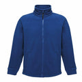 Introducing the RG122 by Regatta Professional: a cozy blue fleece jacket with a full zip front. It boasts a high collar and two convenient front pockets, crafted from soft and warm material to keep you comfortable in cooler weather.