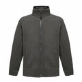 The RG122 by Regatta Professional is a dark gray fleece jacket featuring a full zipper, high collar, and long sleeves. It comes with two front pockets and is showcased against a white background.