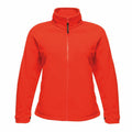 The RG123 by Regatta Professional is a vibrant orange zip-up fleece jacket featuring a high collar and long sleeves.