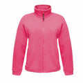 The RG123 by Regatta Professional is a bright pink fleece jacket featuring a high collar and full front zipper, showcased against a white background. It boasts long sleeves and offers a simple design.