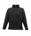The RG138 by Regatta Professional is a black zip-up fleece jacket featuring a high collar and two front pockets.