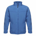 A Regatta Professional RG150 blue full-zip jacket on a plain white background, featuring a high collar and two front pockets. The fabric has a smooth appearance with visible seams.