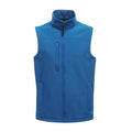 The RG154 by Regatta Professional is a sleeveless blue vest with a high collar, highlighted by a vertical zippered chest pocket and two side pockets.