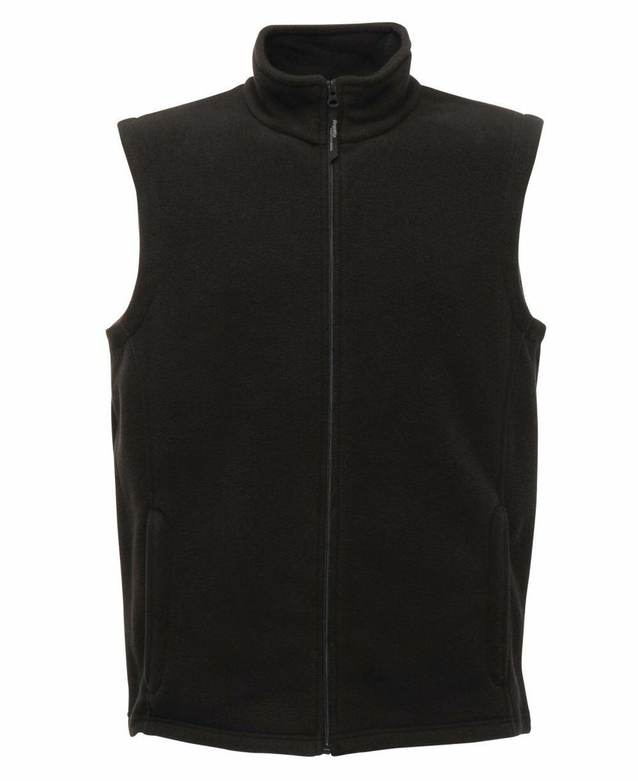A RG185 vest from Regatta Professional, featuring a sleeveless design with a full zipper and high collar in black, is displayed against a white background.