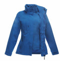 The RG192 by Regatta Professional is a blue jacket featuring a high collar, zippered front, and multiple pockets.