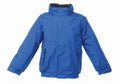 A blue RG244 winter jacket from Regatta Junior, featuring a high collar and long sleeves. The design includes front pockets and elastic cuffs, displayed against a plain white background.