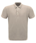 A plain beige polo shirt, model RG300, from Regatta Professional, featuring a collar and three buttons down the front.