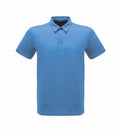 The product RG300 by Regatta Professional is a casual and simple plain blue polo shirt featuring short sleeves, a collar, and a three-button placket on the front.