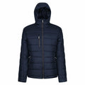 The Regatta Professional RG338 is a dark blue puffer jacket featuring a hood, a front zipper, and two zippered pockets on each side. It is quilted to provide padded warmth and comfort.