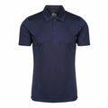 The RG363 from Regatta Honestly Made is a plain navy blue polo shirt featuring short sleeves and a three-button collar.