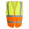 The Regatta High Visibility RG469 vest is designed for high visibility, featuring a bright yellow and orange color with reflective silver stripes, multiple pockets, and a zipper front.