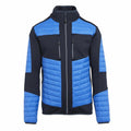 The RG540 by Regatta Professional is a blue and black zip-up jacket with a high collar and padded sections. It includes two zippered chest pockets and showcases a color-block design featuring blue panels on the sleeves, shoulders, and front.