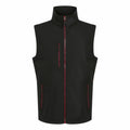 The RG595 by Regatta Professional is a black sleeveless vest featuring red zippers and three pockets, showcased against a white background.