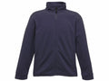 RG601 by Regatta Classics is a navy blue zip-up jacket featuring long sleeves and side pockets, showcased against a plain white background.