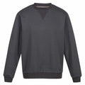 The RG614 by Regatta Professional is a plain, dark gray crewneck sweatshirt featuring long sleeves, a ribbed collar, cuffs, and waistband, plus a small V-shaped stitch detail at the neckline.