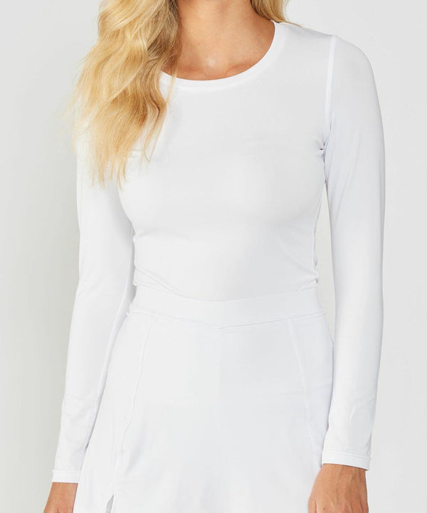 A person wearing a fitted, long-sleeved white top and a matching white skirt (RH003 by Rhino). The individual's face is not visible.