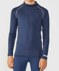 A person is wearing a long-sleeve navy blue athletic top with grey stitching details and the word "RH01B" printed on the left sleeve from Rhino.