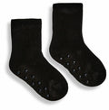 A pair of Ribbon RI009 black socks featuring rubber grips on the soles, shown against a white background.