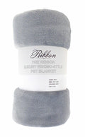 A rolled-up, gray pet blanket labeled "RI015 by Ribbon.