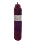 A long, burgundy Hot Water Bottles & Covers set with a matching faux fur cover is shown upright, featuring a grey label around the centre.