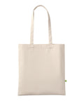 A plain, off-white canvas bag tote with two parallel handles and a small green tag on the right side, photographed against a white background.