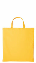 A Nutshell RL110 tote bag in yellow, featuring two handles, showcased against a white background.