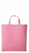 The Nutshell RL110 is showcased against a white background as a pink tote bag with short handles.