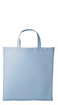 A Nutshell RL110 tote bag in light blue fabric, featuring simple handles and showcased against a plain white background, embodies a minimalist design with no visible logos or patterns.