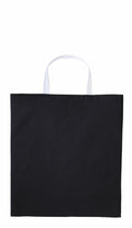A RL130 tote bag by Nutshell, featuring a sleek black design with striking white handles, showcased against a minimalist white background.