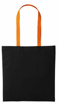 Nutshell RL150 tote bag in black with orange handles.