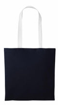 The RL150 by Nutshell, a black tote bag featuring long white handles, is displayed flat against a plain white background.
