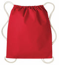 A Nutshell RL300 backpack in red, featuring white drawstrings, is positioned flat on a white background. The strings form loops on each side, creating shoulder straps.