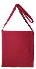 A Nutshell RL400, a red fabric shoulder bag with a long single strap, showcased against a white background.