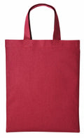 A Nutshell RL500, a red cloth tote bag with two handles, displayed against a plain white background.