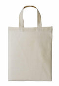 The RL500 by Nutshell is a plain beige canvas tote bag featuring two handles, displayed flat against a white background. The bag appears to be empty.