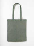 A Nutshell RL600 plain green tote bag featuring long handles on a white background.