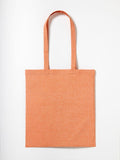 The Nutshell RL600, an orange fabric tote bag featuring two long handles, is displayed against a plain white background.