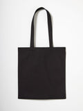 A Nutshell RL650 plain black tote bag with long handles set against a white background.