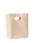 A "Bags" canvas tote bag, beige and rectangular, stands upright with a die-cut oval handle near the top centre against a white background.