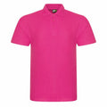 The RX101 by ProRTX is a vibrant bright pink polo shirt featuring short sleeves and a classic collar. It includes a three-button placket and offers a straightforward design, presented on a plain white background.