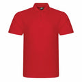A plain red short-sleeved polo shirt from ProRTX, model RX101, features a folded collar and three buttons at the top. The shirt is displayed against a white background.