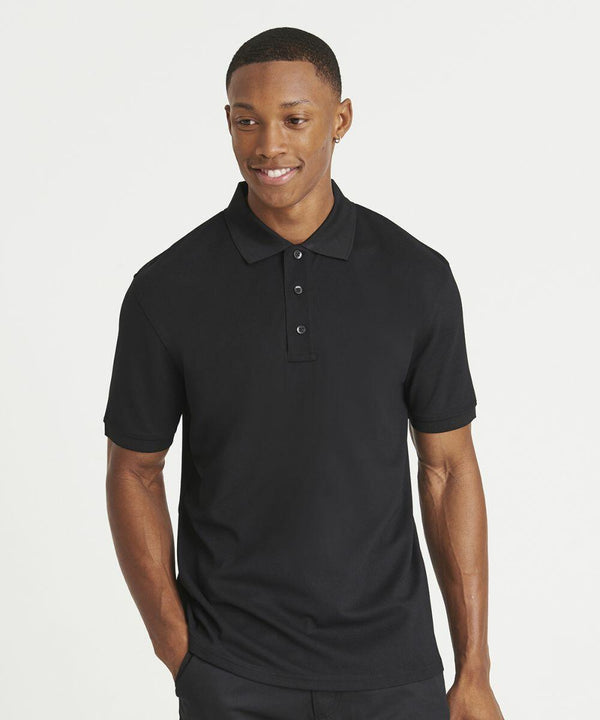 A person wearing a black ProRTX RX109 short-sleeve polo shirt stands against a plain white background, smiling slightly and looking to the side.