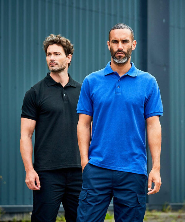 Two men standing outdoors; one wearing a black ProRTX RX110 polo shirt and the other wearing a blue ProRTX RX110 polo shirt.