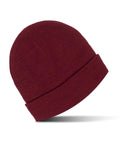 A plain maroon knitted beanie from Beanies, featuring a turned-up brim, displayed on a white background with a subtle shadow underneath.
