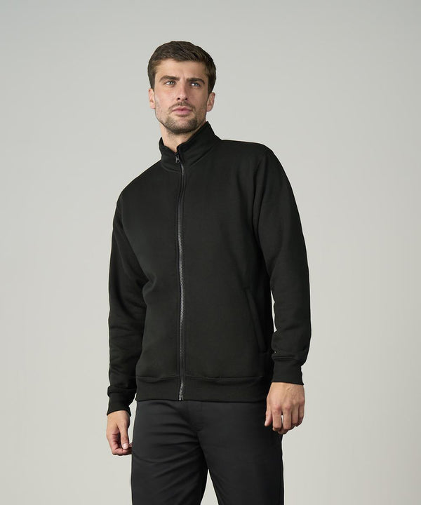 A man with short brown hair and light stubble wears the ProRTX Pro full-zip sweatshirt in black, paired with black trousers, standing against a plain light grey background and looking slightly to the side with a neutral expression.