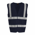 The RX700 by ProRTX is a black safety vest with gray reflective stripes across the chest and shoulders, designed for enhanced visibility.