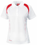 A S177F short-sleeve polo shirt by Spiro in white with red accents on the shoulders and sides, featuring a three-button collar and the brand name Spiro visible near the bottom hem.