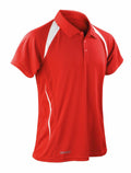 The S177M by Spiro is a red polo shirt with short sleeves, featuring white accents on the shoulders and sides. It includes a button-up collar and is crafted from lightweight, sporty material.