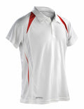 A Spiro S177M short-sleeve polo shirt in white, featuring red accents on the shoulders and sides. It includes a collar and a buttoned placket, with the Spiro brand name visible at the bottom. The fabric appears breathable and is designed for sports activities.
