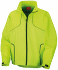 Introducing the Spiro S185X windbreaker jacket in a vibrant yellow-green shade, featuring black zipper and trim details. This stylish jacket comes with two front pockets and a high collar for added comfort.